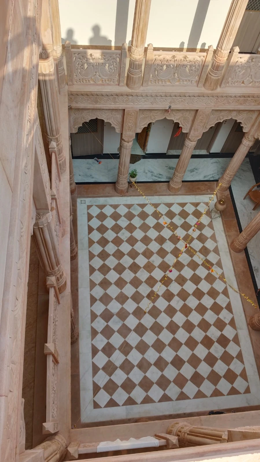 Open courtyard, photographed from the terrace looking downward